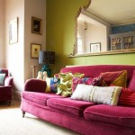 pink-velvet-couch-green-walls