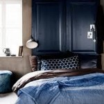 indigo blue bedroom, doors as headboard